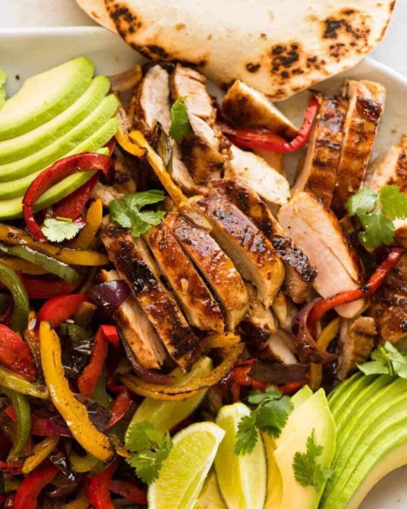 Spicy Mexican Chicken Fajitas with Peppers and Onions